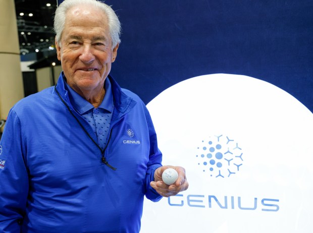 PGA Tour winning golfer Dave Stockton displays a GENIUS golf ball at the PGA Show at the Orange County Convention Center on Thursday, Jan. 22, 2026. The ball features internal electronics that transmit data to an app on a user's phone. (Rich Pope, Orlando Sentinel)