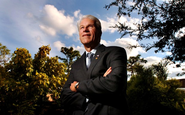University of Central Florida president John Hitt, looking to the future, outside the Burnett Honors College at UCF on Dec.15, 2005. (Joe Burbank/Orlando Sentinel file)