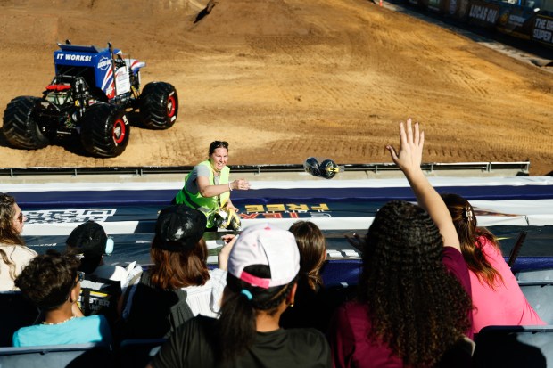 Lauren Barry throws some added ear protection into the group in the stands. Taken during the Blind Touch-A-Truck event for kids and teenagers from Lighthouse Central Florida on Friday, January 9, 2025. (Rich Pope/Orlando Sentinel)