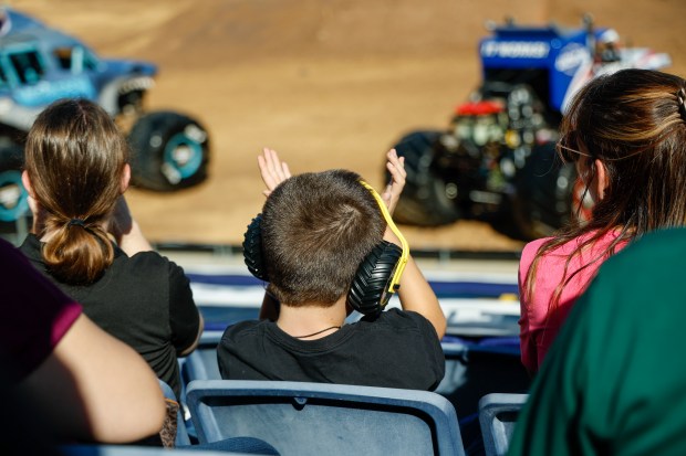 Kaiser Peters claps as the Classroom Crusher engine roars to life. Taken during the Blind Touch-A-Truck event for kids and teenagers from Lighthouse Central Florida on Friday, January 9, 2025. (Rich Pope/Orlando Sentinel)