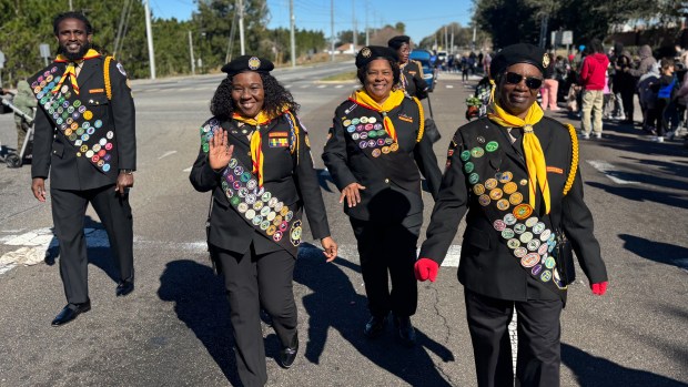 Pathfinders wave and make their way down the parade route during Ocoee's 18th Annual Dr. Martin Luther King Jr. Unity Parade on Monday, January 19, 2026. (Rich Pope/Orlando Sentinel)