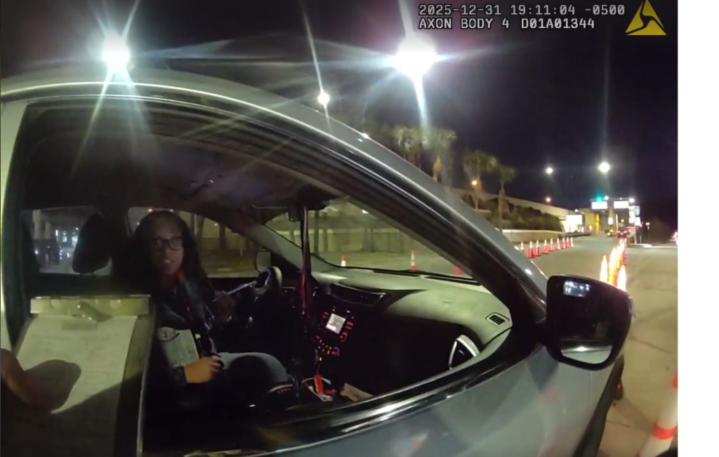 Police say commissioner Shan Rose impeded traffic after game