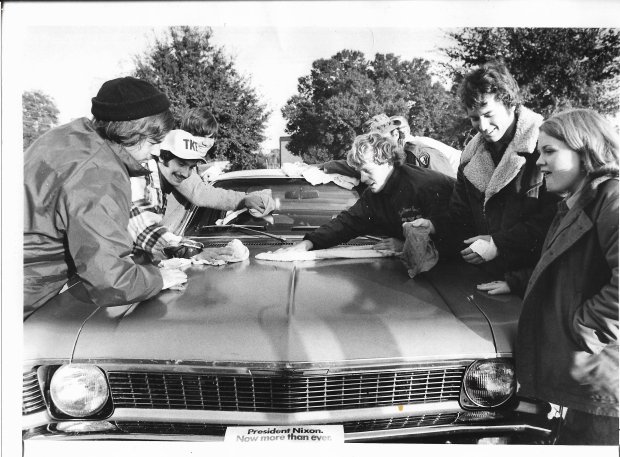 Members of the FTU Tau Kappa Epsilon fraternity work toward a goal of washing cars for 50 consecutive hours at a Winter Park Texaco station in November 1972 to help raise funds for a student needing a kidney transplant. Adding to the difficulty was temperatures in the high-40s. (Sentinel file)