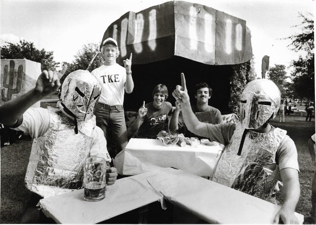 Members of the Tau Kappa Epsilon fraternity at UCF show who they think has the No. 1 float in the Knights' homecoming parade in October 1982. (Sentinel file)