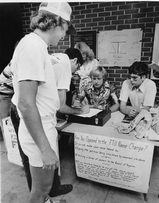 Members of the Delta Tau Delta fraternity ask FTU students to sign a petition to keep the school's name as Florida Technological University and not change it to University of Central Florida in this 1978 photo. (Sentinel file)