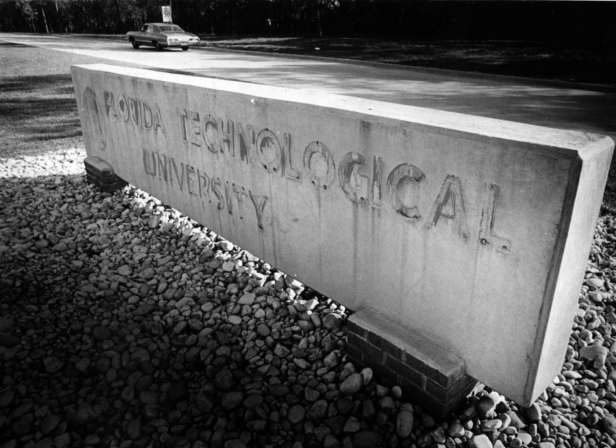 The letters are removed from the university sign on the...