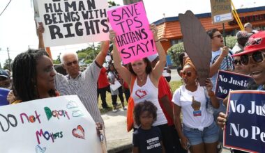 Pro-immigration demonstrators protest in front of a federal office in Miami.