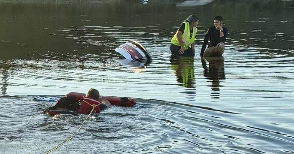 Two rescued from sinking car after crash into I-75 retention pond in Fort Myers