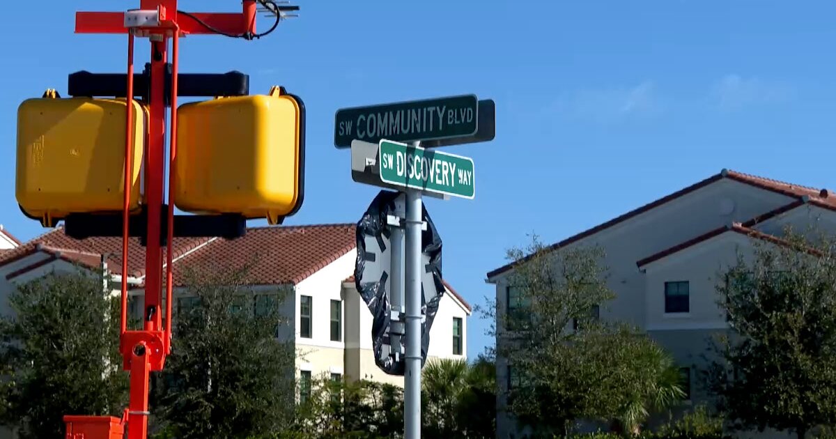 City adds traffic signal to busy Tradition intersection