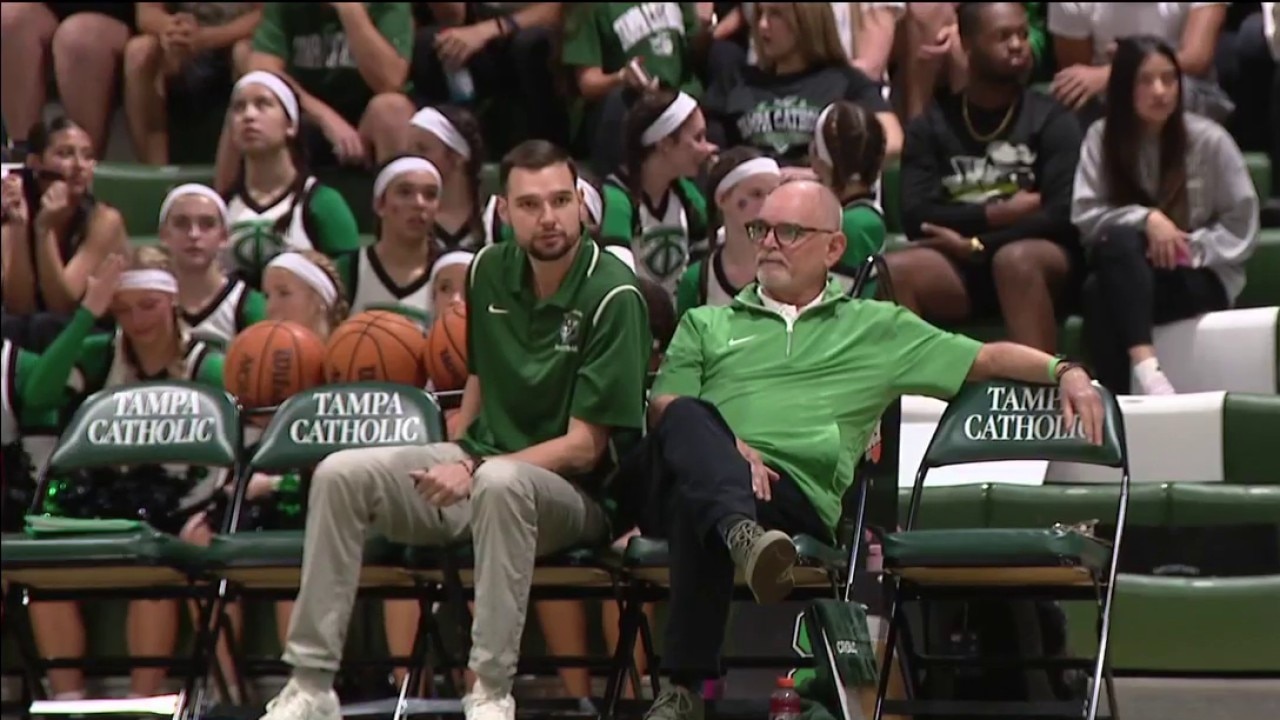 Father and son coaching together for Tampa Catholic hoops