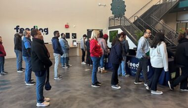 Volunteers signing up at Feeding Tampa Bay. (Spectrum News)