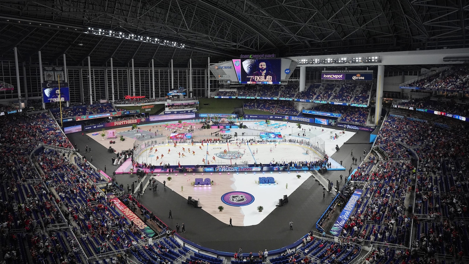 Panthers and Rangers play outdoor hockey game in Miami, replete with snow and fire