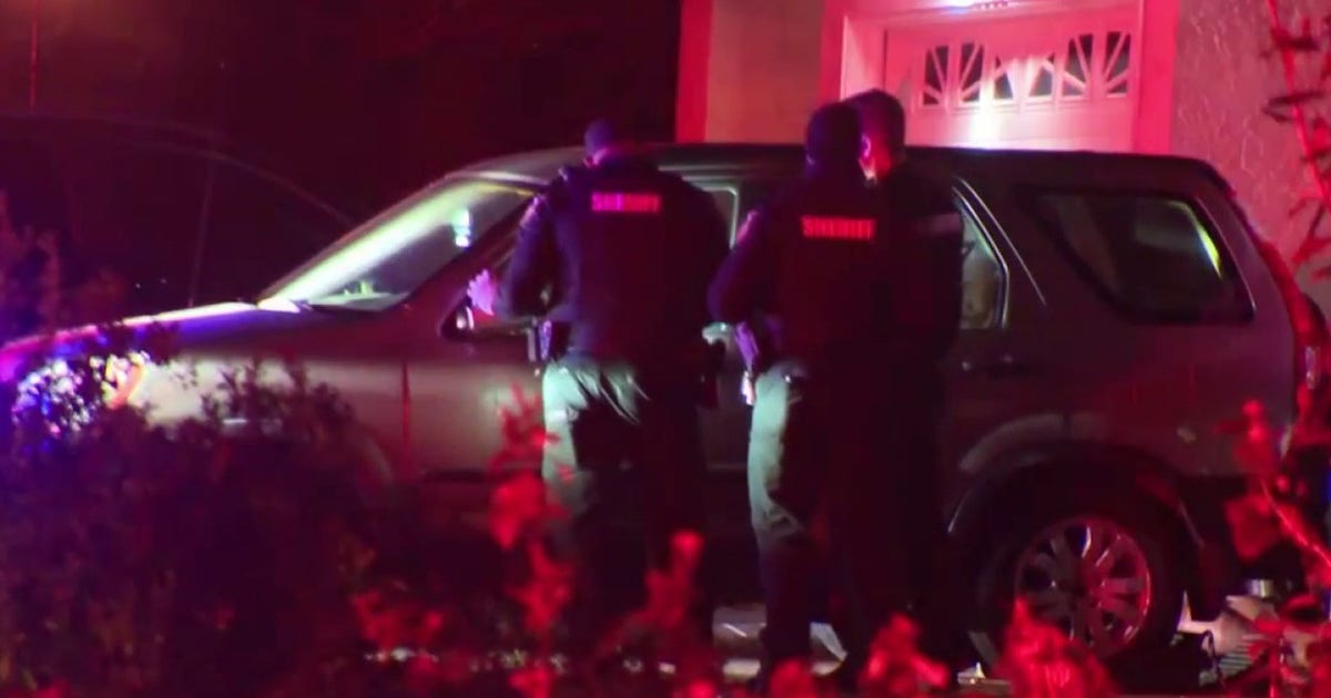 Man barricades himself in car after Orange County house fire, deputies say