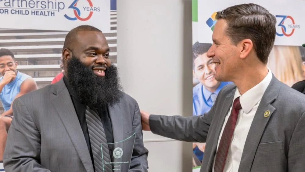 The Rev. Korey O’Neal receives the FBI Director’s Community Leadership Award.