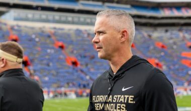 Nov 29, 2025; Gainesville, Florida, USA; Florida State Seminoles head coach Mike Norvell walks the sidelines before a game against the Florida Gators at Ben Hill Griffin Stadium. Mandatory Credit: Bob Kupbens-Imagn Images