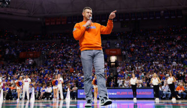 Jan 24, 2026; Gainesville, Florida, USA; Florida Gators Football head coach Jon Sumrall addresses the crowd during a timeout against the Auburn Tigers during the first half at Exactech Arena at the Stephen C. O'Connell Center. Mandatory Credit: Matt Pendleton-Imagn Images