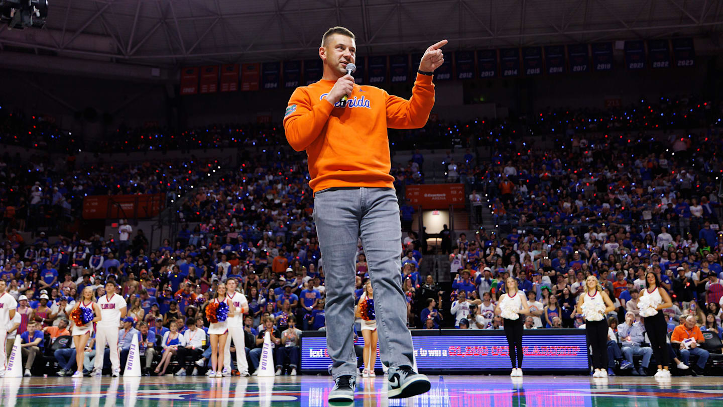 Jan 24, 2026; Gainesville, Florida, USA; Florida Gators Football head coach Jon Sumrall addresses the crowd during a timeout against the Auburn Tigers during the first half at Exactech Arena at the Stephen C. O'Connell Center. Mandatory Credit: Matt Pendleton-Imagn Images