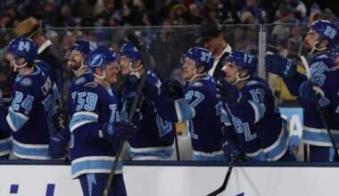 Feb 1, 2026; Tampa Bay, Florida, USA; Tampa Bay Lightning center Jake Guentzel (59) is congratulated by teammates after scoring a goal against the Boston Bruins during a shootout in the 2026 Stadium Series ice hockey game at Raymond James Stadium. Mandatory Credit: Kim Klement Neitzel-Imagn Images