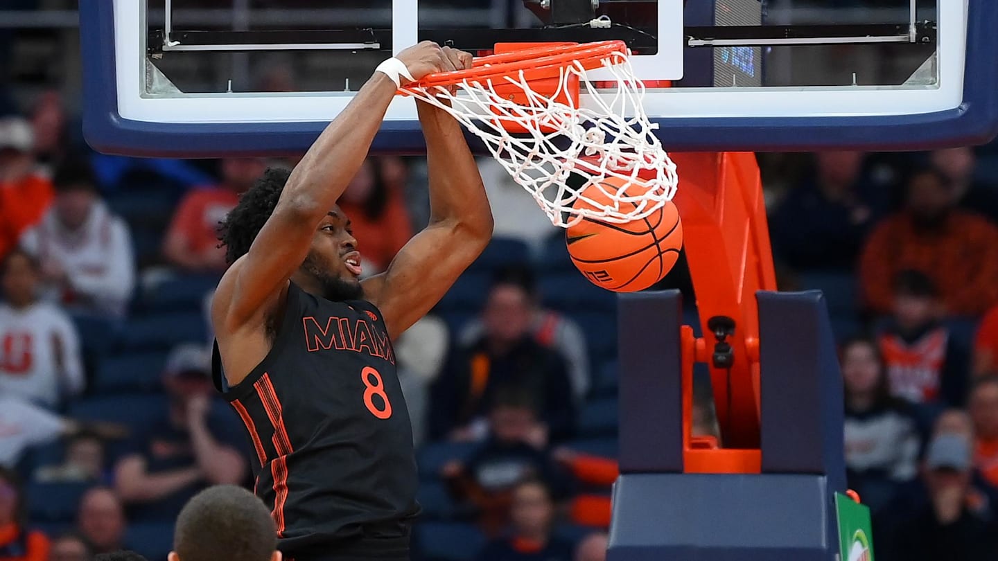 Jan 24, 2026; Syracuse, New York, USA; Miami Hurricanes center Ernest Udeh Jr. (8) dunks during the second half against the Syracuse Orange at the JMA Wireless Dome. Mandatory Credit: Rich Barnes-Imagn Images