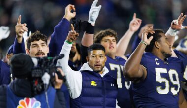 Notre Dame head coach Marcus Freeman celebrates with his players after winning a NCAA football game 70-7 against Syracuse at Notre Dame Stadium on Saturday, Nov. 22, 2025, in South Bend.