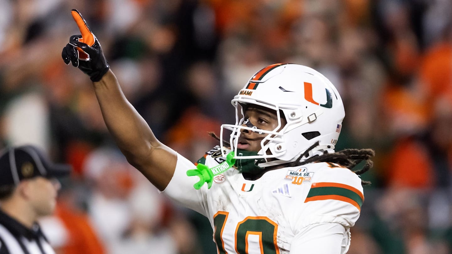 Jan 19, 2026; Miami Gardens, FL, USA; Miami Hurricanes wide receiver Malachi Toney (10) celebrates after scoring a touchdown against the Indiana Hoosiers during the College Football Playoff National Championship game at Hard Rock Stadium. Mandatory Credit: Mark J. Rebilas-Imagn Images