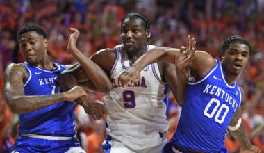 Florida center Rueben Chinyelu (9) is boxed out by Kentucky guard Otega Oweh (0) and forward Brandon Garrison (10) as the Florida Gators face the Kentucky Wildcats at the Stephen C. O’Connell Center on Saturday, Feb. 14, 2026, in Gainesville, Fla.
