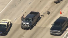 A damaged pickup truck at the scene of a fatal crash on I-95 in Pompano Beach on Feb. 20, 2026.
