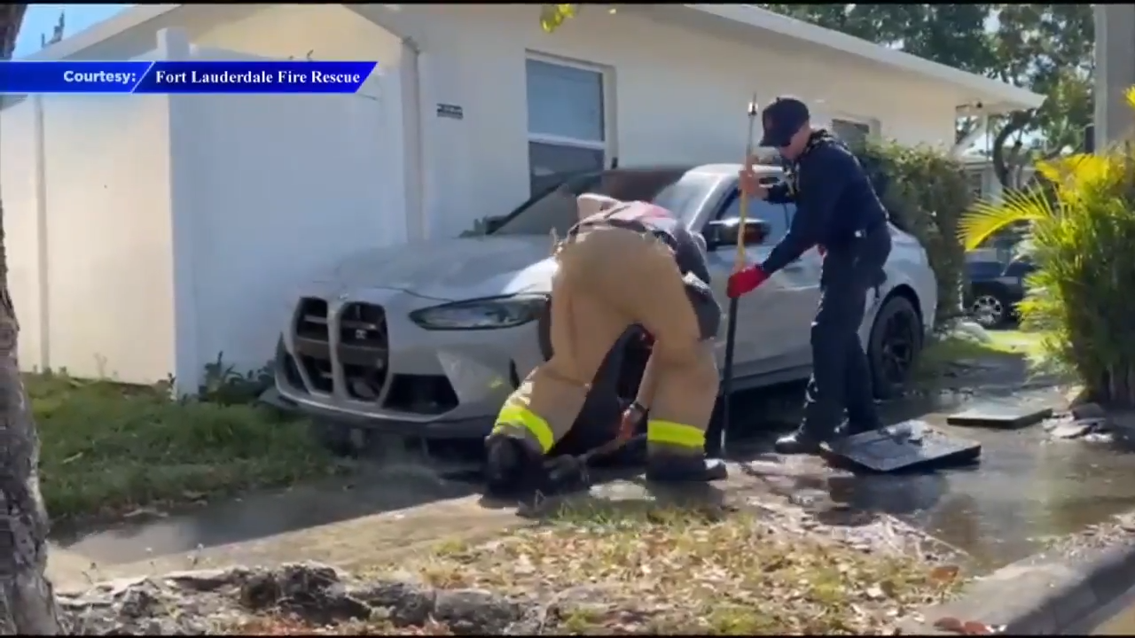 Water line bursts after car crashes into side of Fort Lauderdale apartment building - WSVN 7News | Miami News, Weather, Sports