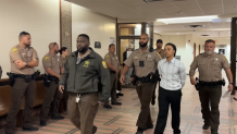 Lonnel Brinson is led into court on Feb. 26, 2026.