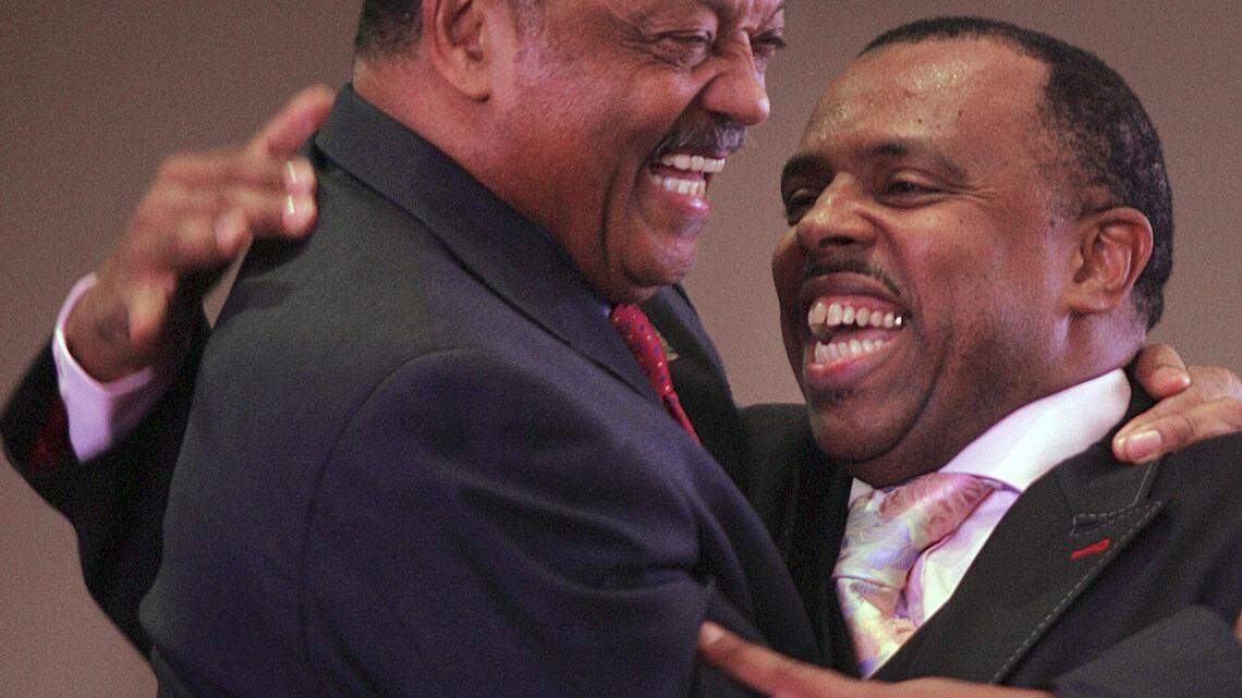 In 2008 in Miami, the Rev. Jesse Jackson and the Rev. Carl Johnson, senior pastor of 93rd Street Community Baptist Church, embrace.