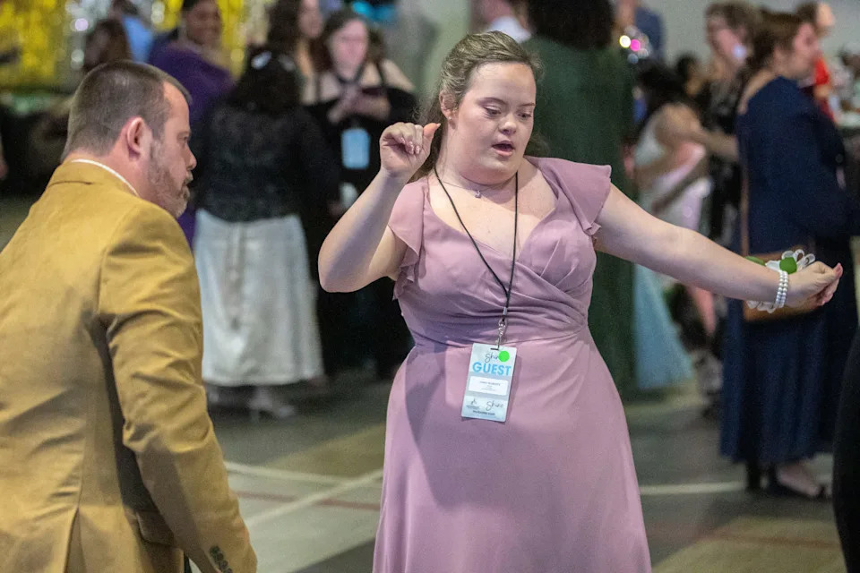 Friends and family enjoy 'Night to Shine,' a celebratory and inclusive prom experience for people with disabilities at Immanuel Baptist Church Friday, Feb. 7 2025.