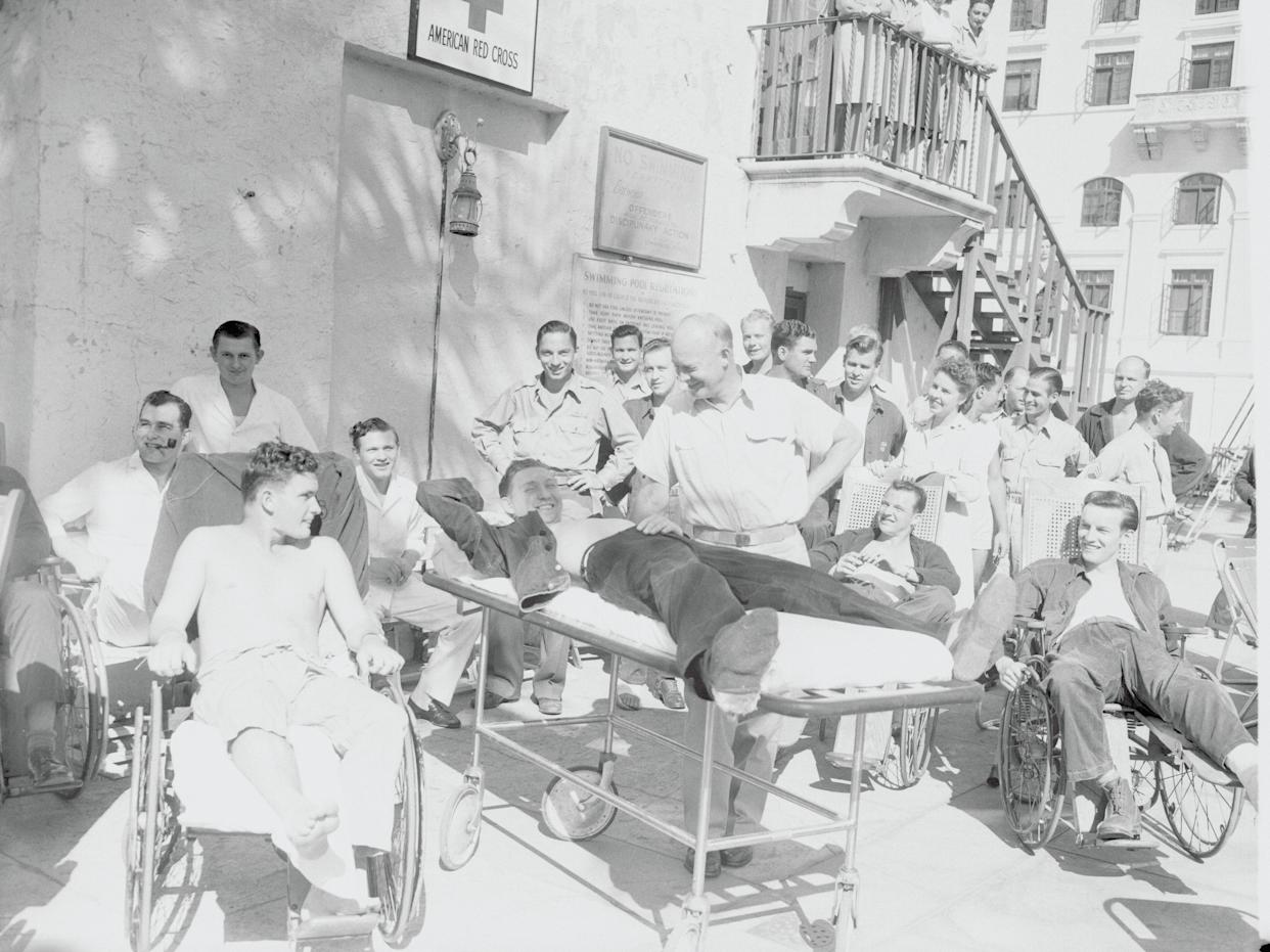 General Dwight D. Eisenhower talking to patients at Biltmore Miami Hote, renamed Pratt General Hospital during the war, Coral Gables, Florida.
