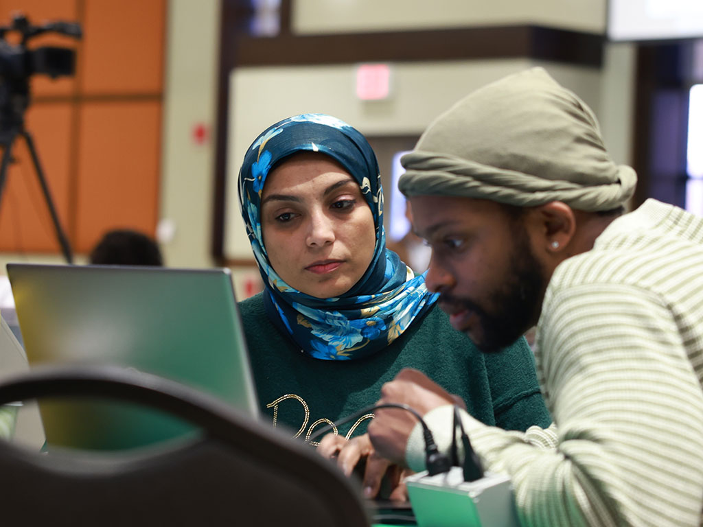 FAMU attendees collaborate on applied learning during a hands-on AI & Data Science Workshop session.