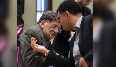 “Richard Aló, Ph.D., shares a moment with event MC Adam Ramgeet during the AI & Data Science Workshop.