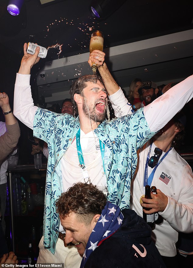 Red Wings star Dylan Larkin enjoys a beer and some champagne while partying in Miami