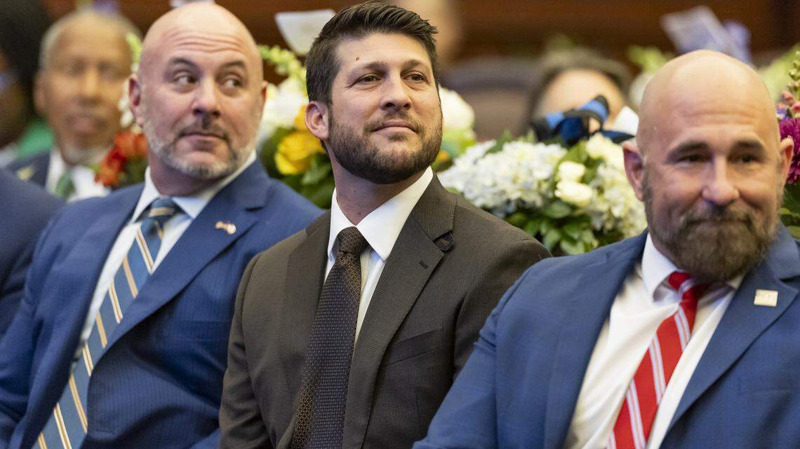 Florida Attorney General James Uthmeier, center, attends the first day of the 2026 legislative session at the Florida State Capitol on Tuesday, Jan. 13, 2026, in Tallahassee, Fla.