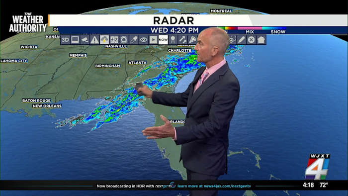 Tracking showers, light rain tonight, Cool and breezy Thursday