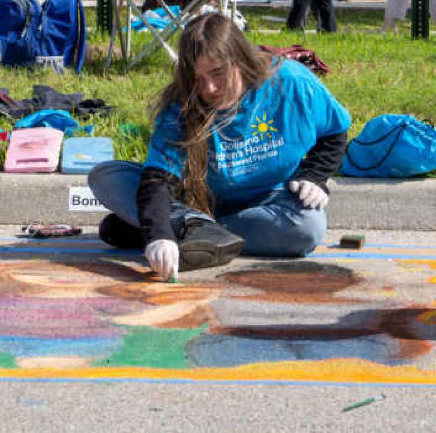 Chalk artist at ArtFest Fort Myers