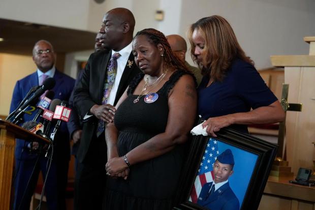 FILE - Attorney Ben Crump, center left, speaks during a news conference with Chantemekki Fortson, mother of slain U.S. Air Force senior airman Roger Fortson, June 3, 2024, in Atlanta. (AP Photo/Brynn Anderson, File)
