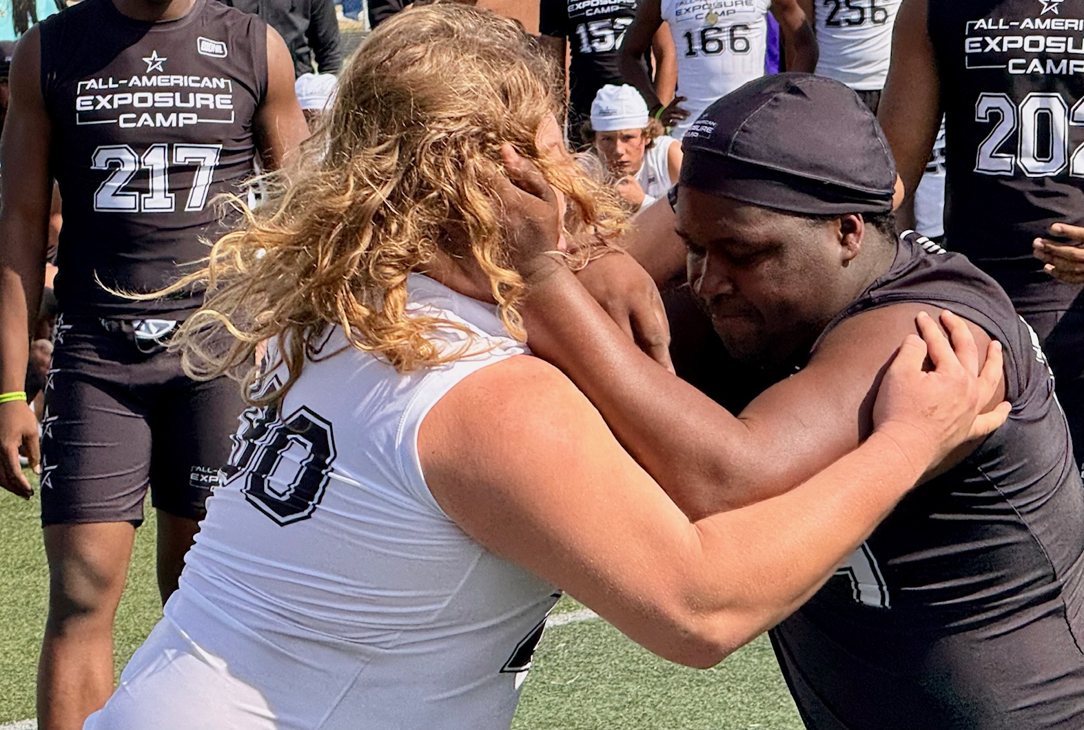 Deltona junior Brayden Koch battles South Lake senior Latraverick Anderson...