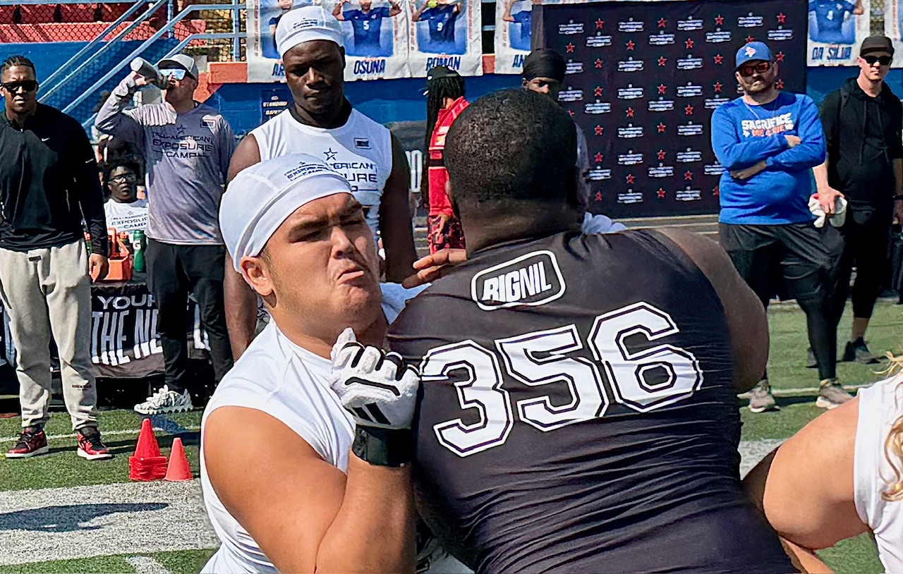 East Ridge senior Fenway Cochrane battles Cocoa senior Tahmeer Passmore...