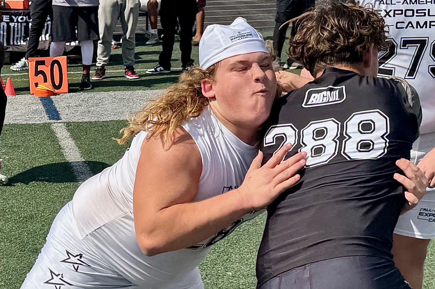 Deltona junior Brayden Koch battles West Orange sophomore Couper Sanders...