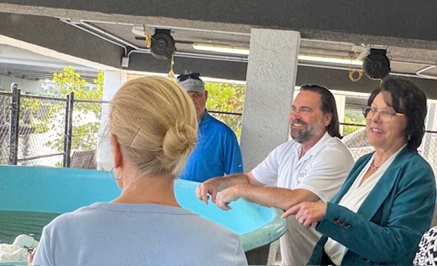 Eileen Connolly-Keesler, at right, president and CEO of the Collier Community Foundation, talks with Dr. Michael Parsons, director of The Vester Field Station, at the reopening of the facility, Monday, February 16, 2026.