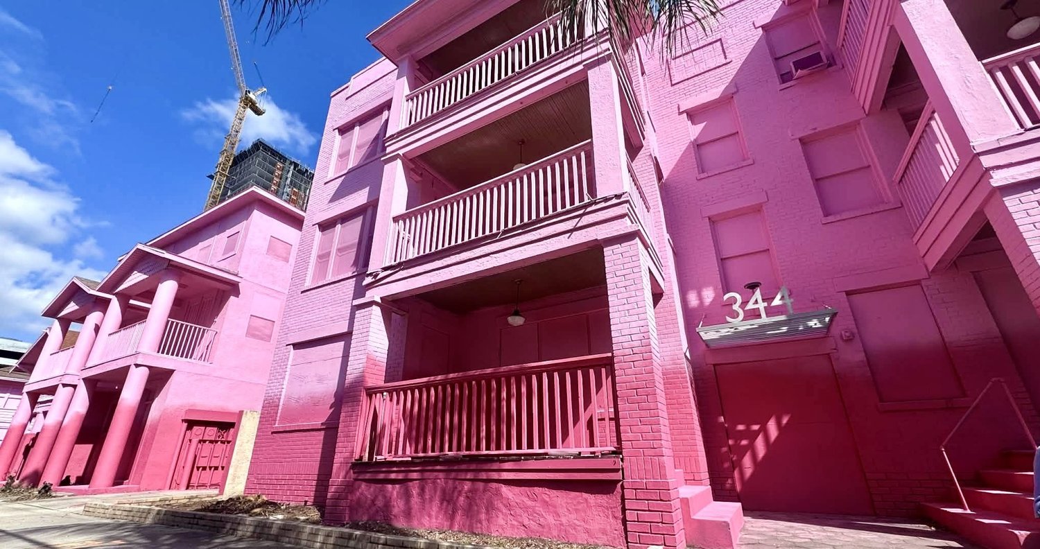 Downtown St. Pete apartments painted pink before demolition makes way for 29-story condo tower