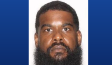 Florida school lifts lockdown after murder suspect sighting