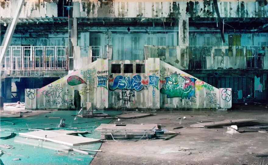 An abandoned building marked with grafitti.