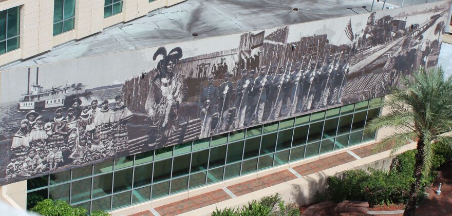 Muralist Barbara Jo Revelle reminded town that Fort Myers was constructed as staging area for the deportation of Native Americans to reservations in Oklahoma.