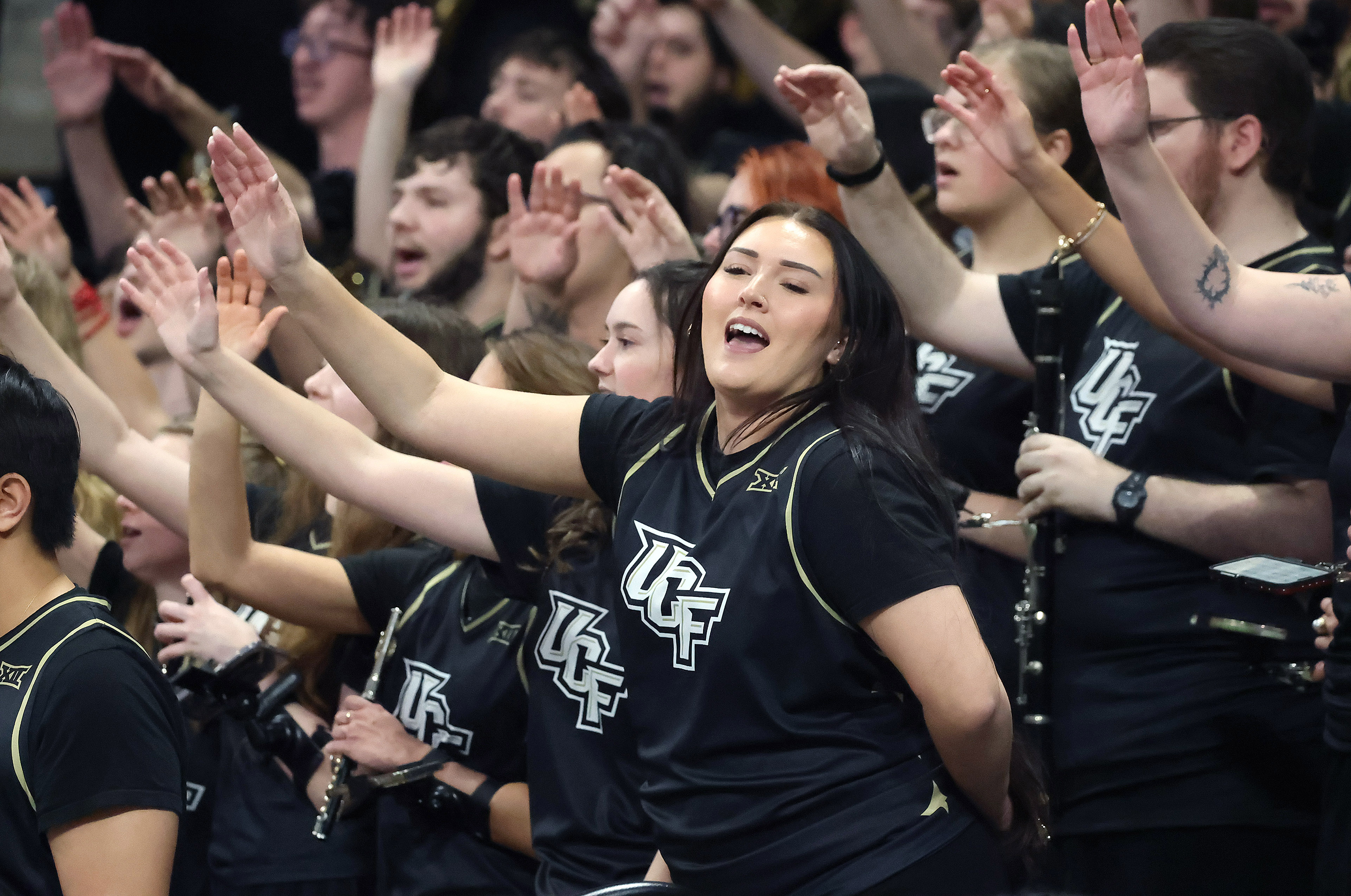 UCF band members cheer during the TCU at UCF college...