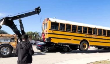 Video captures the moment a sports car crashes into Florida school bus, driver walks away uninjured