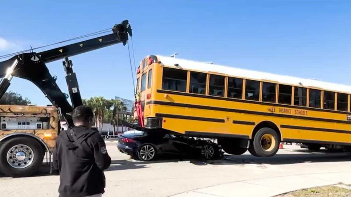 Video captures the moment a sports car crashes into Florida school bus, driver walks away uninjured